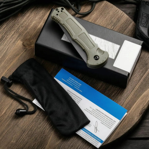 EDC Ready Folding Knife With D2 Steel Blade And Non Slip Fiberglass Handle displayed with pouch and card on wooden table