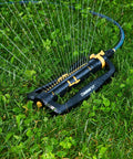 XT Turbo Oscillating Sprinkler For 4500 Sq Ft Quick Connect Bundle with 3 Way Adjustable Width and Range on grass lawn