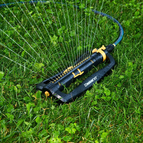 XT Turbo Oscillating Sprinkler For 4500 Sq Ft Quick Connect Bundle with 3 Way Adjustable Width and Range on grass lawn