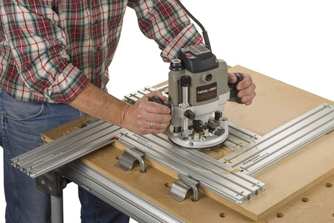 Person using Dead On Heavy Duty Adjustable Variable Router Jig Kit 18X32 Inch for precise woodworking cuts.