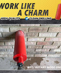 Side view of a red 3-inch wet core drill bit with a 1-1/4-inch-7 arbor resting against a brick wall