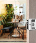 Slick Brushed Nickel Pocket Sliding Door Lock And Privacy Pull Handle With Reversible Latch Hardware Kit For Smooth Glide And No Sweat Setup On Interior Doors Sized One Three Eighths Inch Thick, installed in wood door.