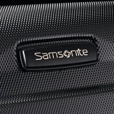 Samsonite luggage close-up on black textured hardside shell