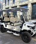 Electric Golf Cart With Reliable Lithium Battery And Built In Insulated Cooler White Four Plus Two Seater with spacious seats and 14 inch tires.