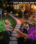 Outdoor Solar Bug Zapper 4200V Mosquito Killer in garden with RGB flame lights and children playing, safe for child and pet.