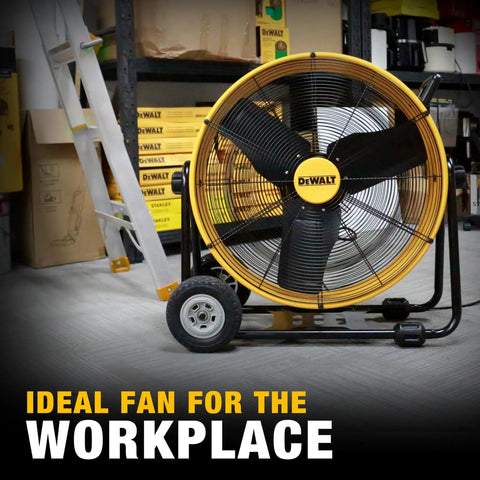 Beefy Workhorse 24 Inch Industrial Drum Fan With High Velocity Airflow in a workplace, metal floor fan, 360 degree tilt, large wheels, yellow.