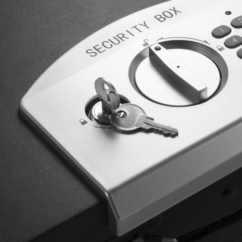 Close-up of the keypad and key slot on the Rock Solid Portable Top Open Security Desk Safe With Slick Keypad Lock Box.