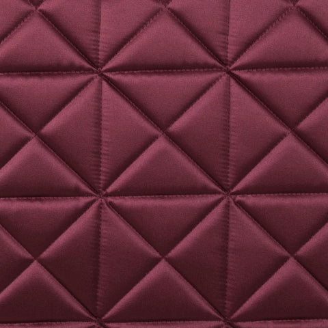 Close-up of Premium Satin Luxe Air Tec Quilted Dressage Saddle Pad texture in burgundy with diamond quilting pattern.