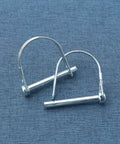 Beefy Heavy Duty Trailer Coupler Pin Pack Of 4 Zinc Plated Carbon Steel Hitch Pin Safety Locking Pins One Quarter Inch By Two Point Sixteen Inches Rust Resistant And Ready For Real World Towing. Close-up view of two pins on textured surface.
