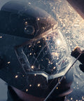 Welder using Panoramic Welding Helmet With True Color Auto Darkening Filter Three Window Design Built In Cooling Fan And LED Headlamp ANSI Z87.1 Plus Certified Ideal For Pros And DIYers