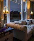 Tall Iron Lace Floor Lamp With Golden Ruby Finish, classic style in a cozy living room setting, ornate scrollwork visible