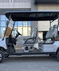 Heavy Duty Four Seater Electric Golf Cart With Premium Luxury Seats And Badass Off Road Tires showing side view with HD LED display.