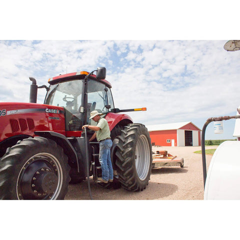 Farmer refueling tractor with Goldenrod Water Absorbing Fuel Filter Replacement Canister With 10 Micron Filtration