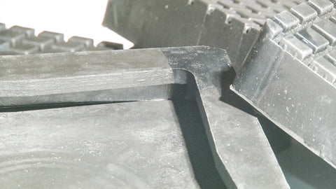 Close-up of Square Rubber Arm Pads For 2 Post Lift Slip-On Replacement, Five Eighths Inch Square By One Sixteenth Inch Thick, OEM Quality.