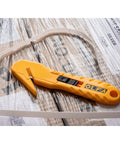 Concealed Blade Safety Knife With Protected Blade For Tape Slitting And Packaging Tasks 4mm Throat Delivers Continual Safe Blade Exposure And Easy One Hand Use For Shipping Warehousing And DIY Jobs. yellow concealed blade safety knife on taped shipping boxes