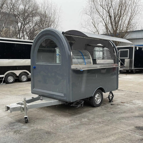Premium Fully Equipped Food Trailer With Complete Mobile Kitchen Setup Designed For Street Vendors And Festival Catering exterior rear view with gray finish and awning.