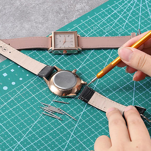 Heavy Duty Watch Band Pins And Spring Bar Tool Kit With 76 Stainless Steel Pins For Quick Band Removal And Repair All In One Handy Watch Strap Repair Set For Men And Women in use on a leather watch strap