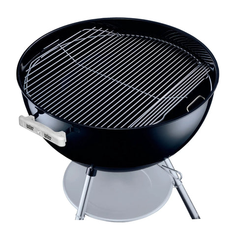 22 Inch Round Hinged Stainless Steel Cooking Grate Replacement for Charcoal Grills with Flip Up Sides shown on a grill.