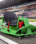 Green 36V Electric Drift Kart For Adults That Feels Like A Pro Ride Drifts Up To 12 MPH Runs About 40 Minutes Per Charge 360 Degree Spin Heavy Duty Frame Supports Up To 300 Lb Great For Indoor And Outdoor Sessions on a race track.