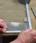 Applying Screen Repair Patch Kit With Fiberglass Mesh And Strong Adhesive For Window And Door Screens to fix a tear