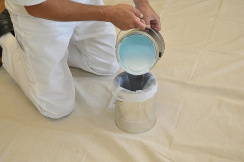 Pouring paint through Regular Mesh Bag Strainers For 1 Gallon Pails Elastic Top 25 Pack 600 Micron White Filters Keeps It Clean No Mess Filtration For Paint Stain And Other Liquids Removes Flakes Lumps Filaments And Dust into metal pail