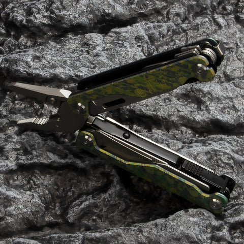 Ultra Lightweight Titanium Alloy Multitool Pliers with Camouflage Finish, 420 Stainless Steel Plier Head open on rocky surface