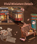 Cherry Blossom Sakura Train Book Nook Kit With LED 3D Wood Puzzle And Infinity Mirror featuring miniature train and blossoms.
