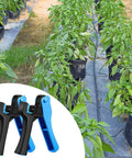Irrigation Tubing Hole Punch Tool For One Quarter Inch Fittings And Emitter Insertion with pepper plants in garden setup