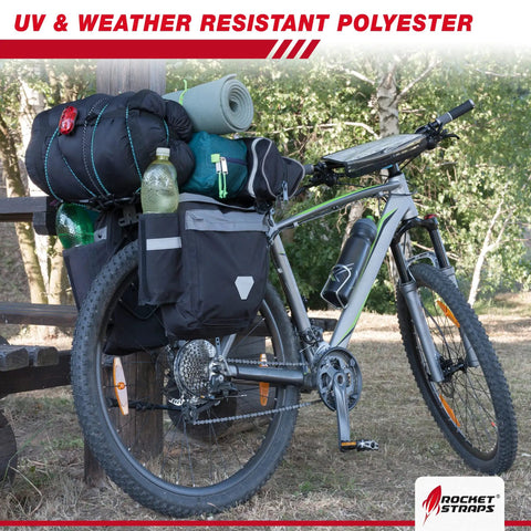 Bicycle loaded with gear secured by Beefy Outdoor Bungee Cord Set With 12 Heavy Duty Cords 72 Inch Long Double J Hooks