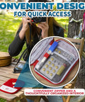Open Two Pack Grab And Go Travel First Aid Bag Set with zippered compartments on outdoor table showing organized medical supplies.