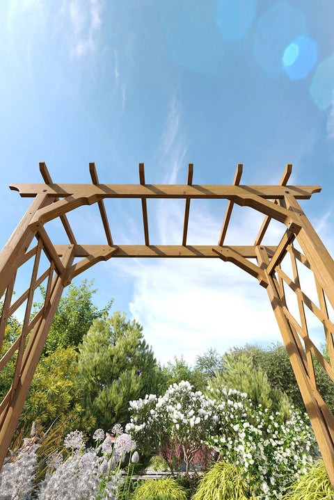 Cedar Wood Garden Arbor 55 By 88 Inches Golden Brown Arch With Lattice Trellis For Climbing Plants in a lush garden setting.