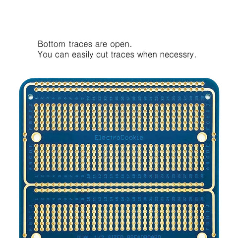 Close-up of large gold plated solderable breadboard prototype kit for DIY electronics projects, blue color, trace cutting feature.