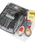 Heavy Duty Rock Solid Stretch Wrap 5 Inch By 1000 Feet Roll With Built In Handle covering office supplies like a label maker and scissors.