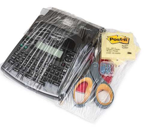 Heavy Duty Rock Solid Stretch Wrap 5 Inch By 1000 Feet Roll With Built In Handle covering office supplies like a label maker and scissors.