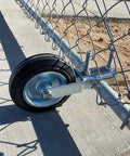 Gate Wheel Supporting Swing Gate Fits One And Five Eighths Inch Through Two And One Eighth Inch Gate Frames attached to chain link fence.