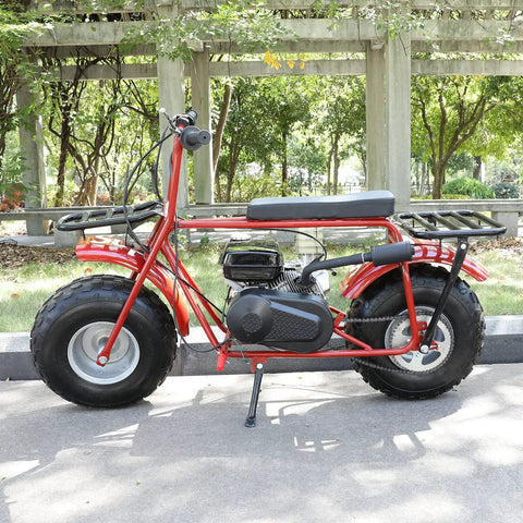 Red mini bike with installed Exhaust Muffler Silencer for Predator 196cc to 420cc engines and GX clones in a park setting
