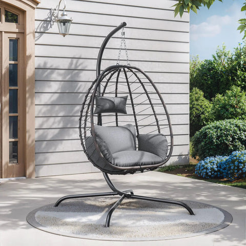 Cozy Outdoor Hanging Egg Chair With Stand For Patio And Garden, wicker design, grey cushions, on patio, side view