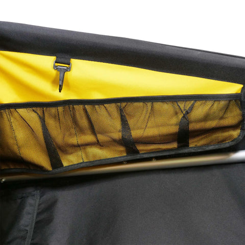 Interior mesh pocket detail of Nomad Touring Cargo Bike Trailer With Water Resistant Cover And Large Storage Capacity, 100 Lb Load Rating