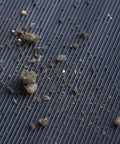 Tough As Nails Vinyl V Groove Floor Mats For Garages Shops And Commercial Spots Oil Grease Chemical Resistant Non Slip Anti Fatigue Mat In Black showing dirt and debris on textured surface.