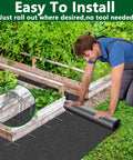 Person installing 10 By 2 Ft Recycled Felt Mulch Mat Roll For Landscaping Garden Pathways And Weed Barrier Eco Friendly Durable
