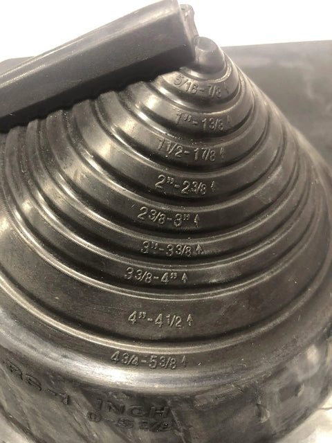 Close-up of Residential Retrofit Pipe Flashing For Shingle Roof And Electrical Mast with size markings and reinforced cone ribs.