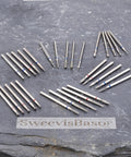 Pro Grade Nail Drill Bits Set For Pedicure And Cuticle Care With Diamond Grit 120 shank burrs arranged on a slate surface