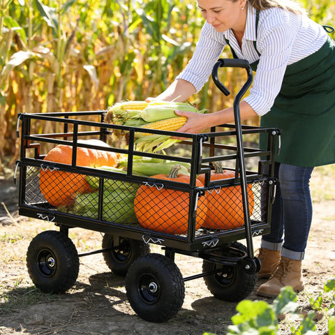 Woman loading corn and pumpkins into Heavy Duty Steel Dump Cart With 600 Lb Capacity Utility Wagon And Inflatable Ten Inch Tires