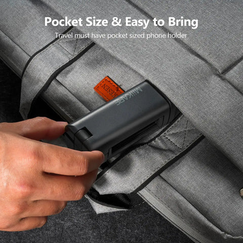 Pocket-sized Airplane Travel Phone Holder Mount For Flying Universal Must Have Hands Free Phone Stand shown in gray bag pocket.