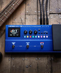 Ultra Portable Bass Effects Processor With Iconic Amps And Effects And AIRD Sound Engine For Beginner Bassists on a wooden floor