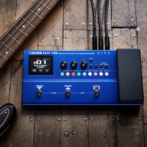 Ultra Portable Bass Effects Processor With Iconic Amps And Effects And AIRD Sound Engine For Beginner Bassists on a wooden floor