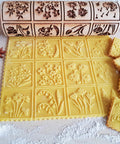 Spring Flowers Embossing Rolling Pin With 16 Floral Squares For Dough And Clay imprinting intricate patterns on dough
