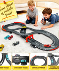 Children playing with Rad Slot Car Race Track Set With Four High Speed Cars Dual Control System Hand Cranked And Electric