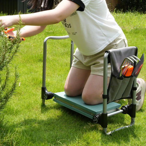 Person using Two In One Garden Kneeler And Seat Bench Foldable Workseat with EVA Foam Pad and Detachable Tool Pouch for gardening