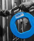 Person using Stainless Steel Fish Tape 240 Feet With Formed Hook And Tuff-Grip Pro Case, Non-Oily Finish for electrical work